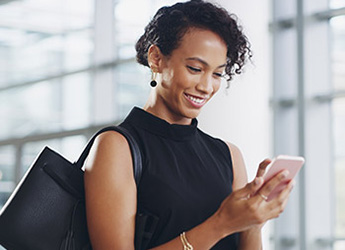Business Woman using cell phone