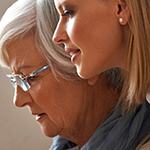 Older woman with younger woman.