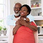 Happy older couple in kitchen