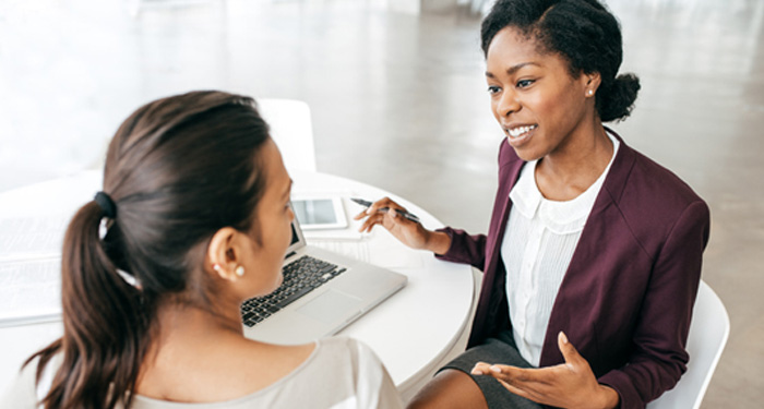 Two women meeting in office