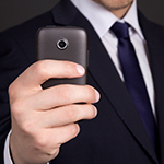 Close up of Business Man with smart phone.